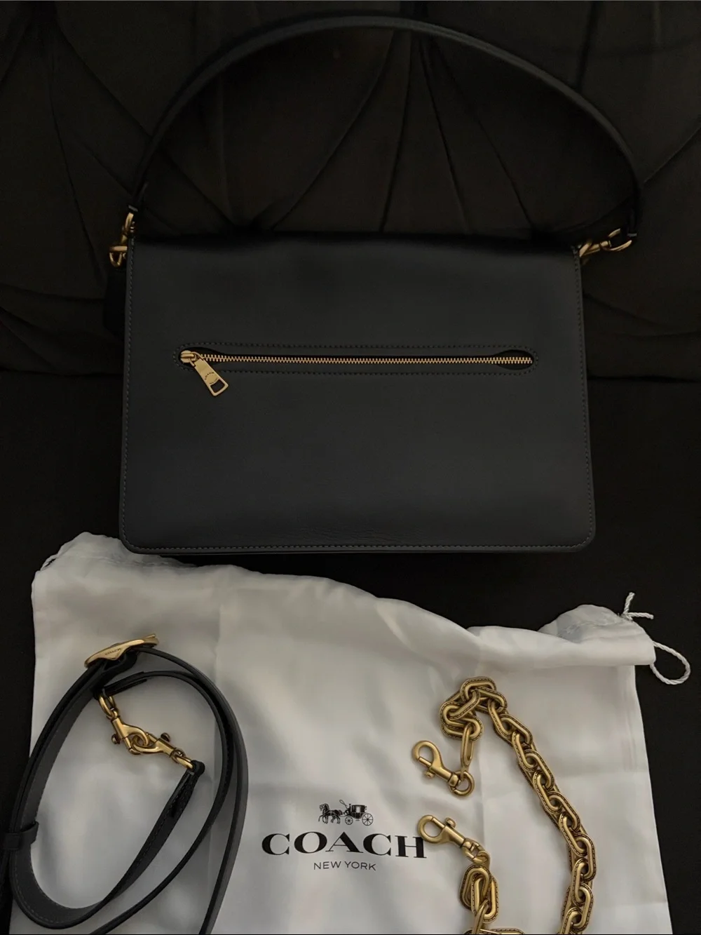 Coach sleek black